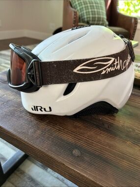 Giro White Ski Helmet Kids with Black Ear Pads and comes with goggles